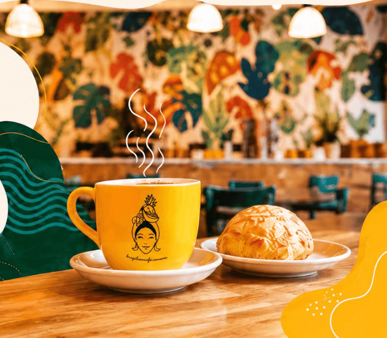 That's Bananas café — yellow cup of coffee with pão de queijo